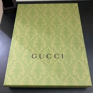 Gucci sweater box and ribbons